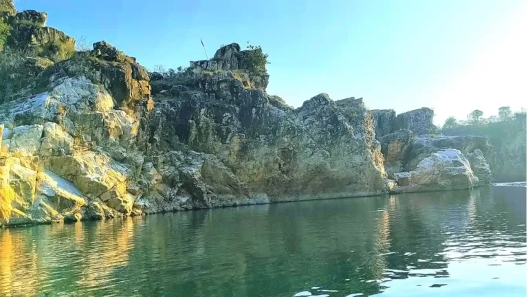 The Golden and Black Rocks formed due to shades of sun as seen during boat ride at Bhedaghat, Jabalpur, MP, India