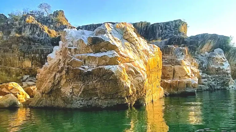 The Golden Rocks formed due to shades of sun as seen during boat ride at Bhedaghat, Jabalpur, MP, India
