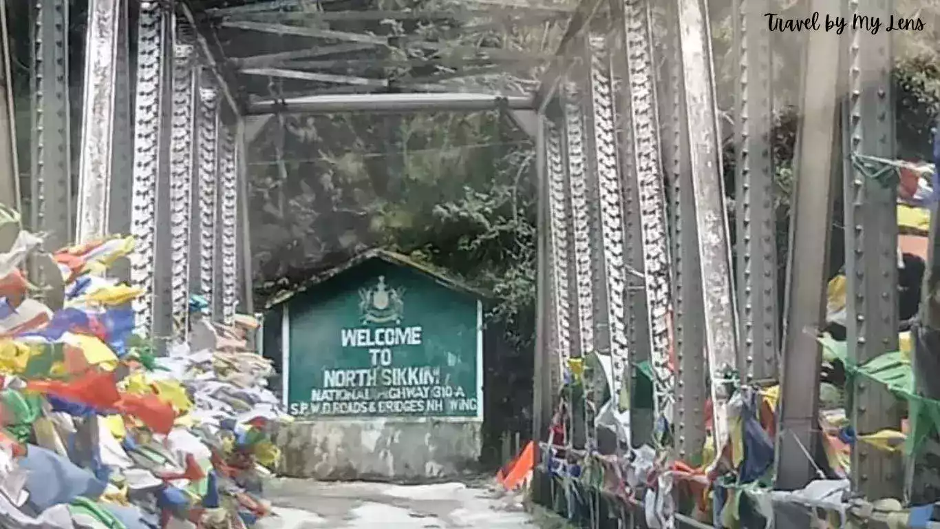 A Bridge connecting to Lachung and Gangtok - Welcome to North Sikkim is written on a board, North Sikkim, India