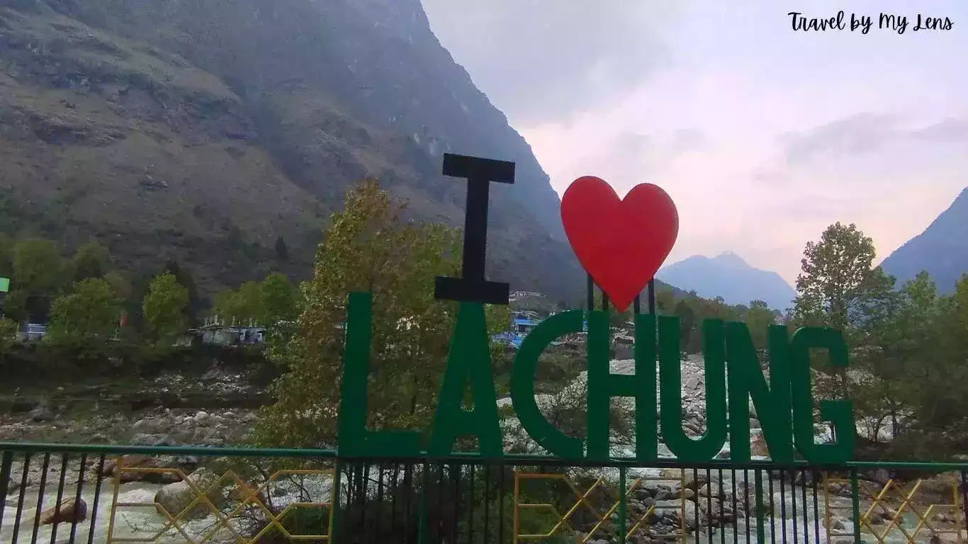 I Love Lachung is written on a huge board, Lachung river is flowing in the background at Lachung, North Sikkim, India
