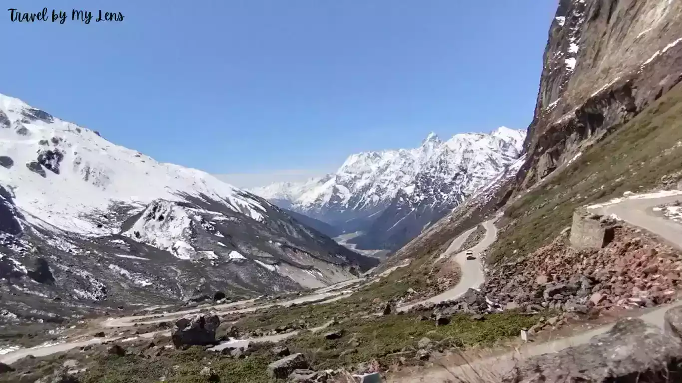 Road to Zero Point from Yumthang Valley, surrounded by breathtaking snowy mountain peaks near Lachung, North Sikkim, India