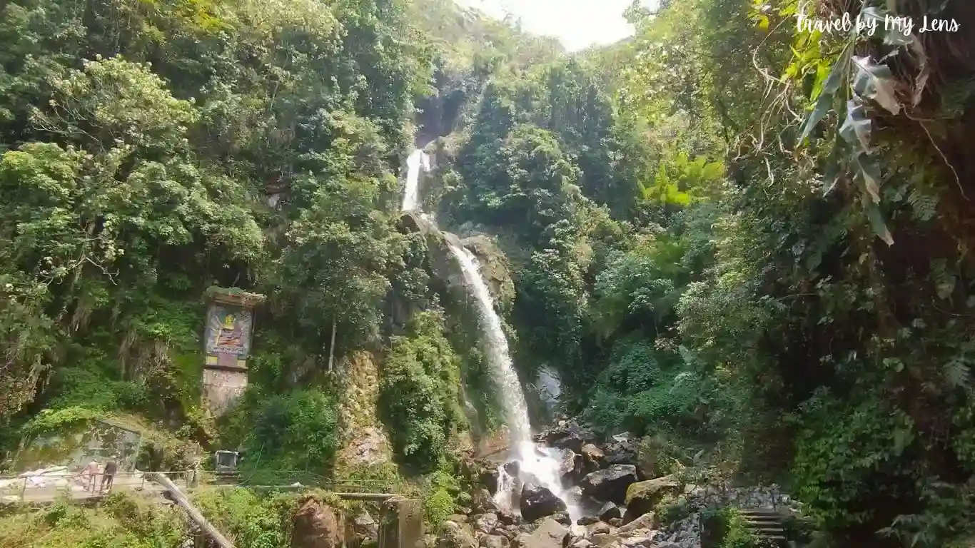 A Buddha statue and Seven Sister Waterfall's Full View, North Sikkim, India