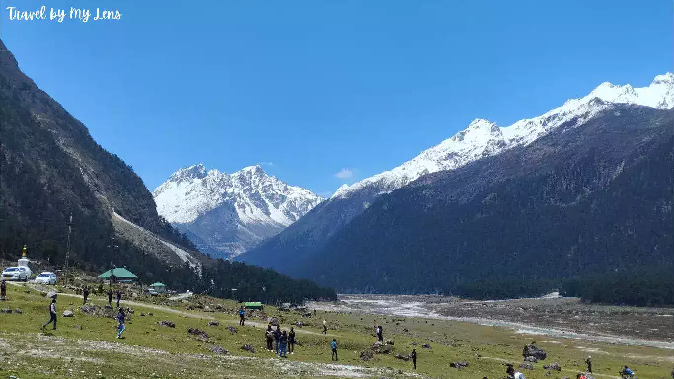 Lush Green Valley is surrounded by snow-capped mountains, Yumthang Valley, Lachung, North Sikkim, India